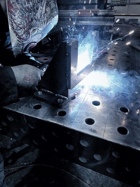 Welding a steel assembly in the shop