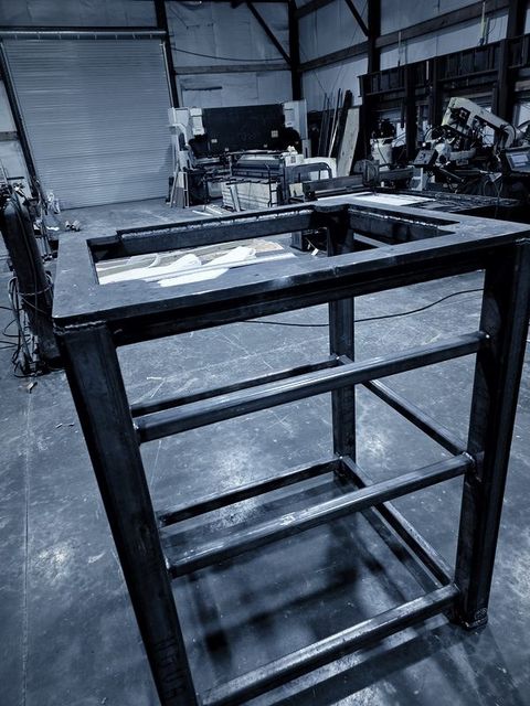 A welded steel frame on the shop floor